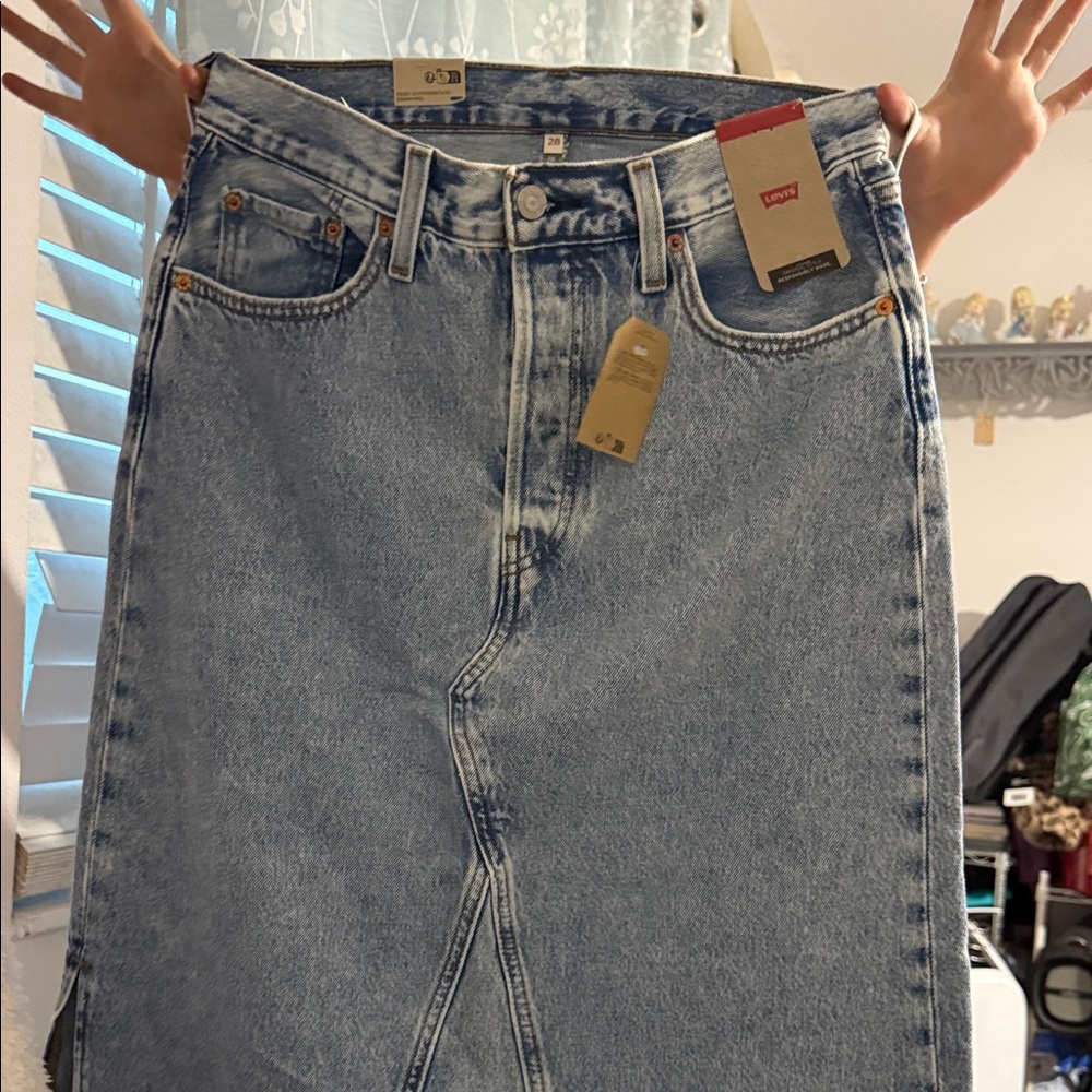Levi's Women's Light Blue long denim skirt with side slit.